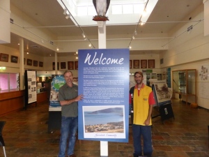Ewen McPhee with Brad Higgins of Menmuny Museum during the re installation of the “Blow ‘Im Exhibition”.